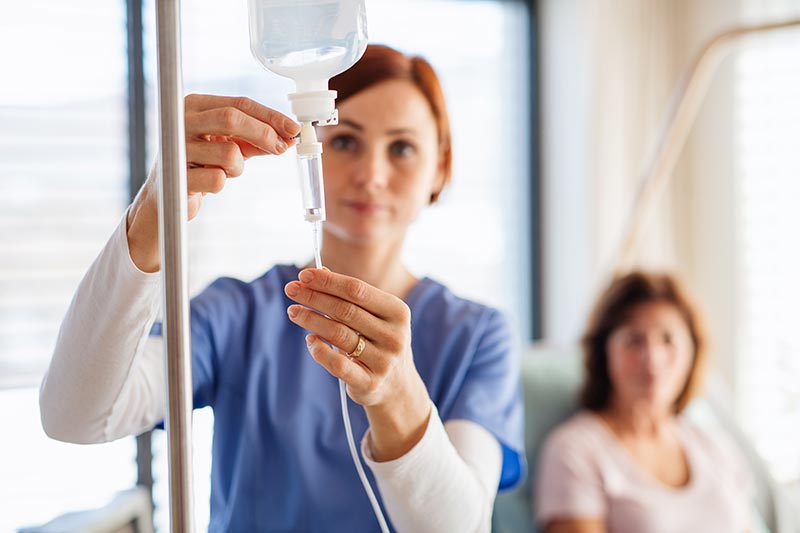 a woman getting IV therapy