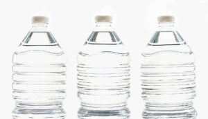 three clear water bottles