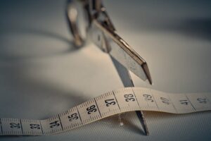 Scissors Cutting a Tape Measure