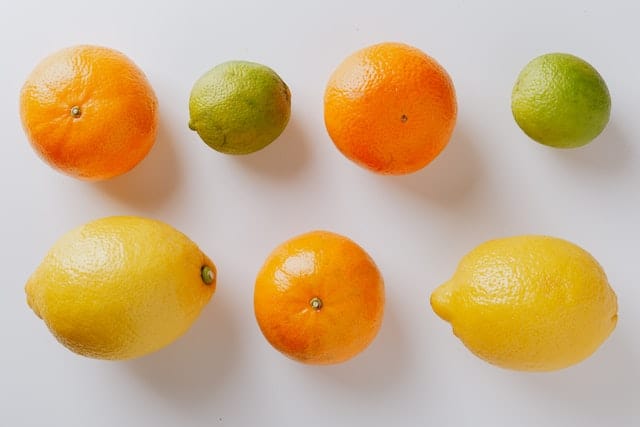 a collection of citrus fruits