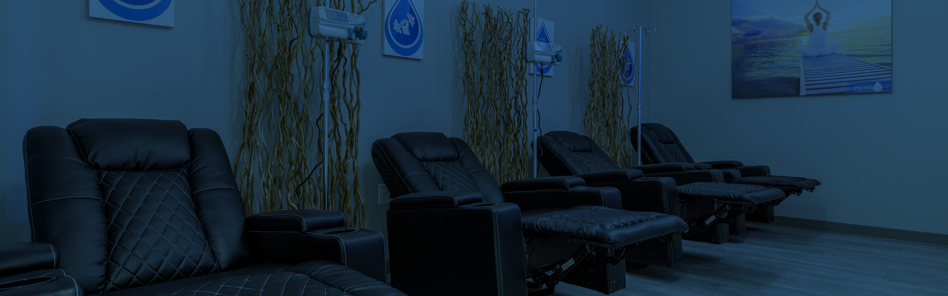 Massage chairs in a wellness clinic prepared for IV treatments